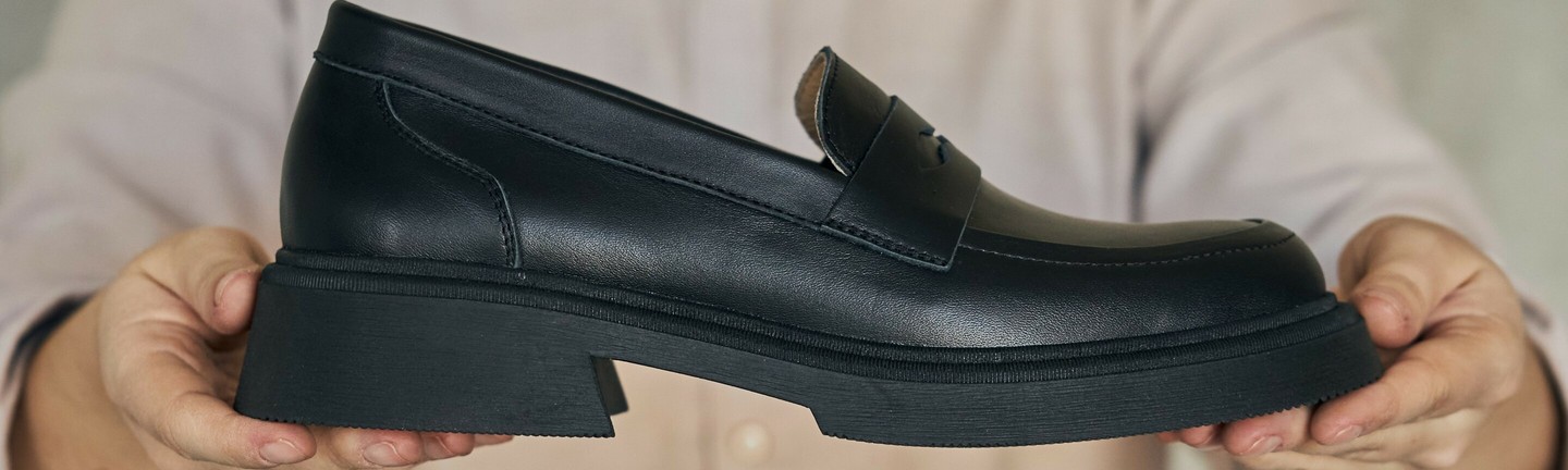 Women's black leather loafers