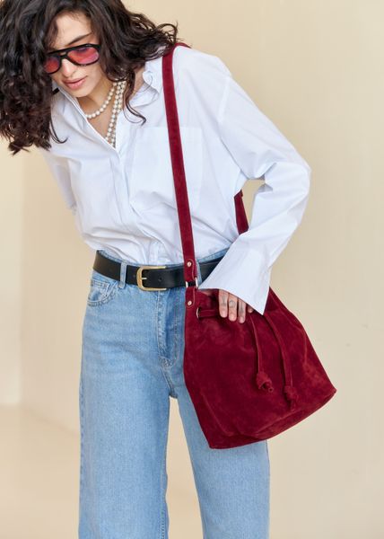 Red suede pouch bag